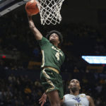 Johnson scores 17 to help West Virginia beat UAB 71-60