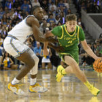 No. 21 UCLA rallies late, hangs on to beat Oregon 65-56