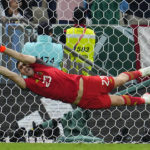 Martinez is Argentina's shootout star again at World Cup
