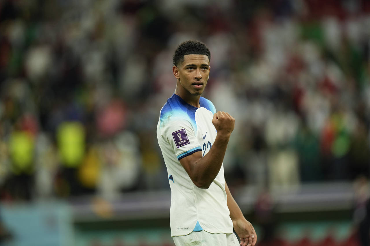 England's Jude Bellingham reacts at the end of the World Cup round of 16 soccer match between Engla...
