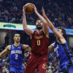 Mitchell scores 34, Cavaliers top Magic 107-96