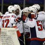 Kuemper makes 32 saves as surging Capitals down Rangers 4-0
