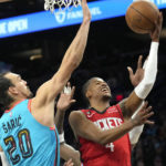 Rockets rally from 16 down to beat Booker, Suns 122-121