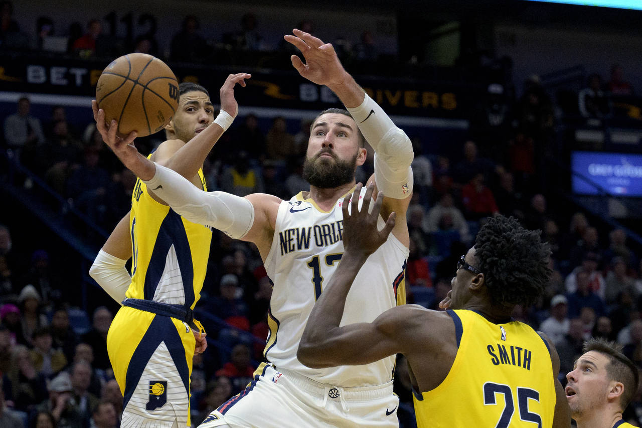 New Orleans Pelicans center Jonas Valanciunas (17) shoots against Indiana Pacers guard Tyrese Halib...