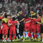 South Korea advances at World Cup after wild finish to group