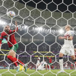 AP PHOTOS: World Cup highlights from Day 19