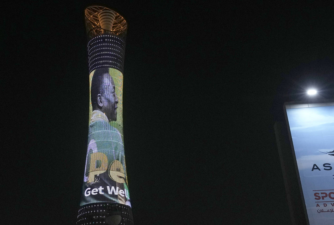 An image of former Brazilian player Pele with the message "Pele, Get well soon" is displayed on the...