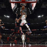DeRozan scores 42 points, Bulls beat Bucks 119-113 in OT