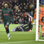 Arsenal fights back to extend league lead to 7 points