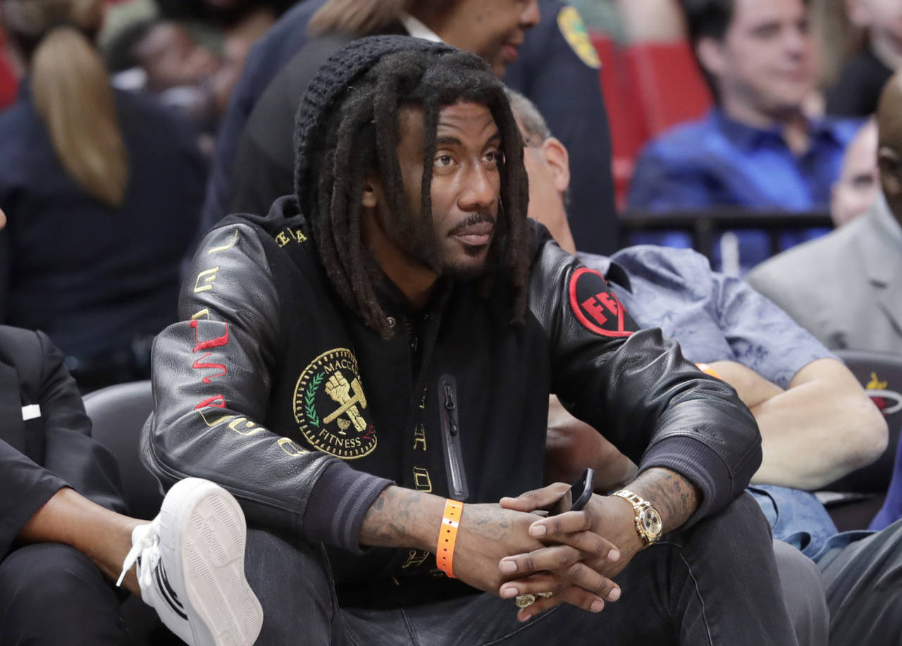 FILE - Former NBA basketball player Amar'e Stoudemire watches during the second half of an NBA bask...