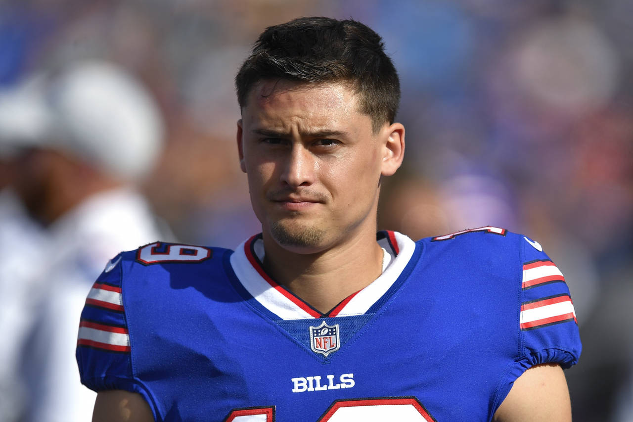 FILE - Then-Buffalo Bills punter Matt Araiza walks on the sideline during the first half of a prese...