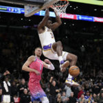 Lakers overcome Davis' absence to beat reeling Wizards