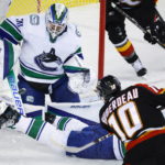 Kuzmenko scores in SO to give Canucks 4-3 win over Flames