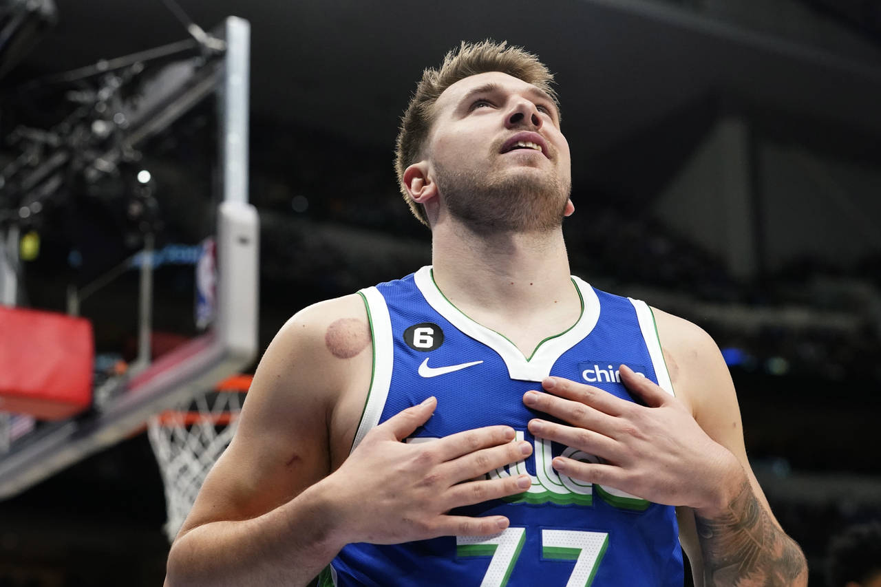 Dallas Mavericks guard Luka Doncic reacts to call during the first quarter of an NBA basketball gam...