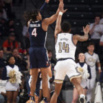 No. 13 Virginia beats Ga Tech, Bennett ties school wins mark