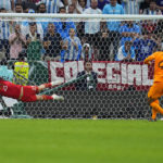 AP PHOTOS: World Cup highlights from Day 18