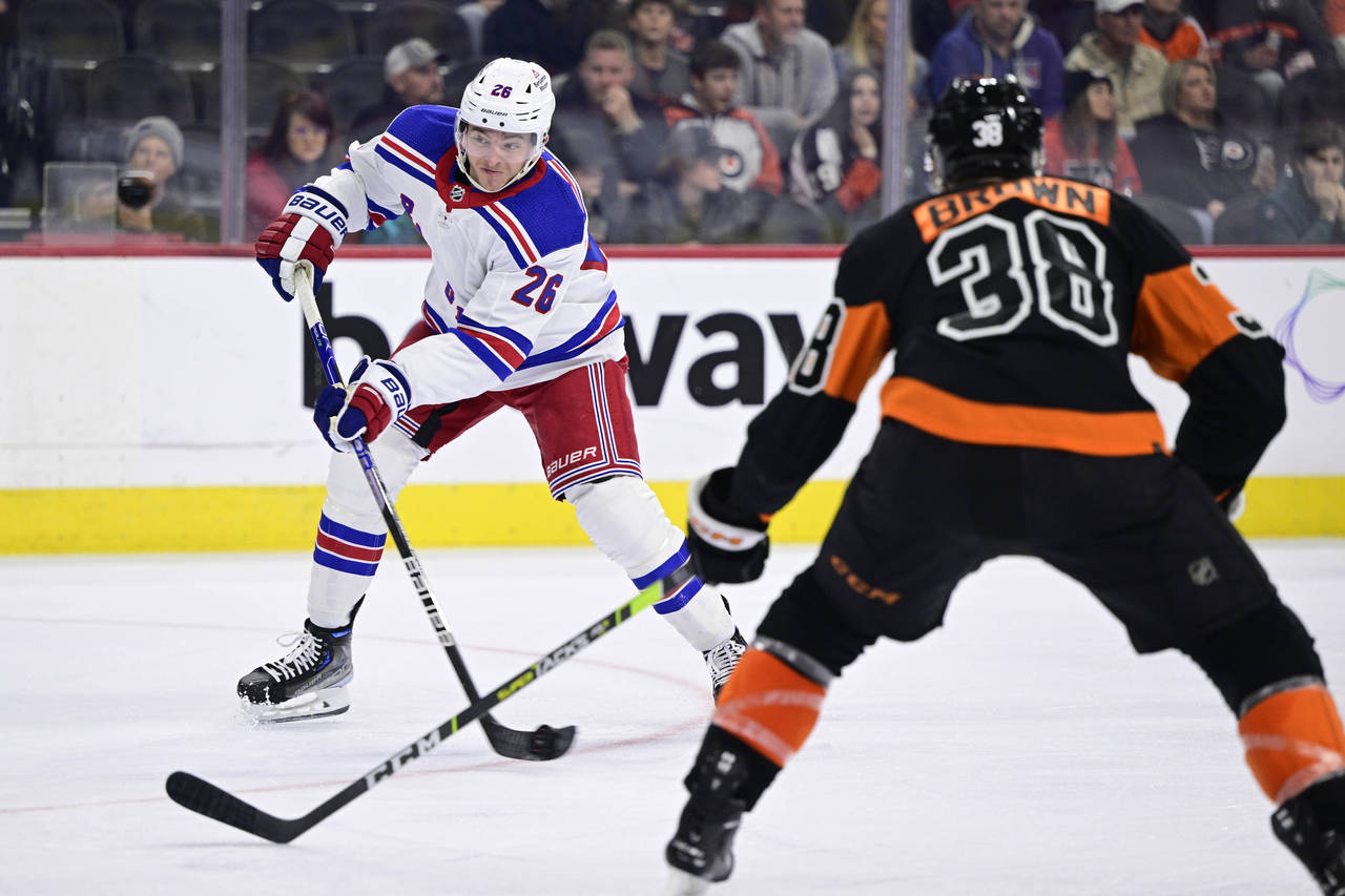 New York Rangers' Jimmy Vesey (26) takes a shot to score a goal during the third period of an NHL h...