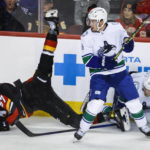 Kuzmenko scores in SO to give Canucks 4-3 win over Flames