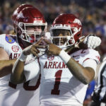 Kansas rallies, but Arkansas wins Liberty Bowl 55-53 in 3OTs