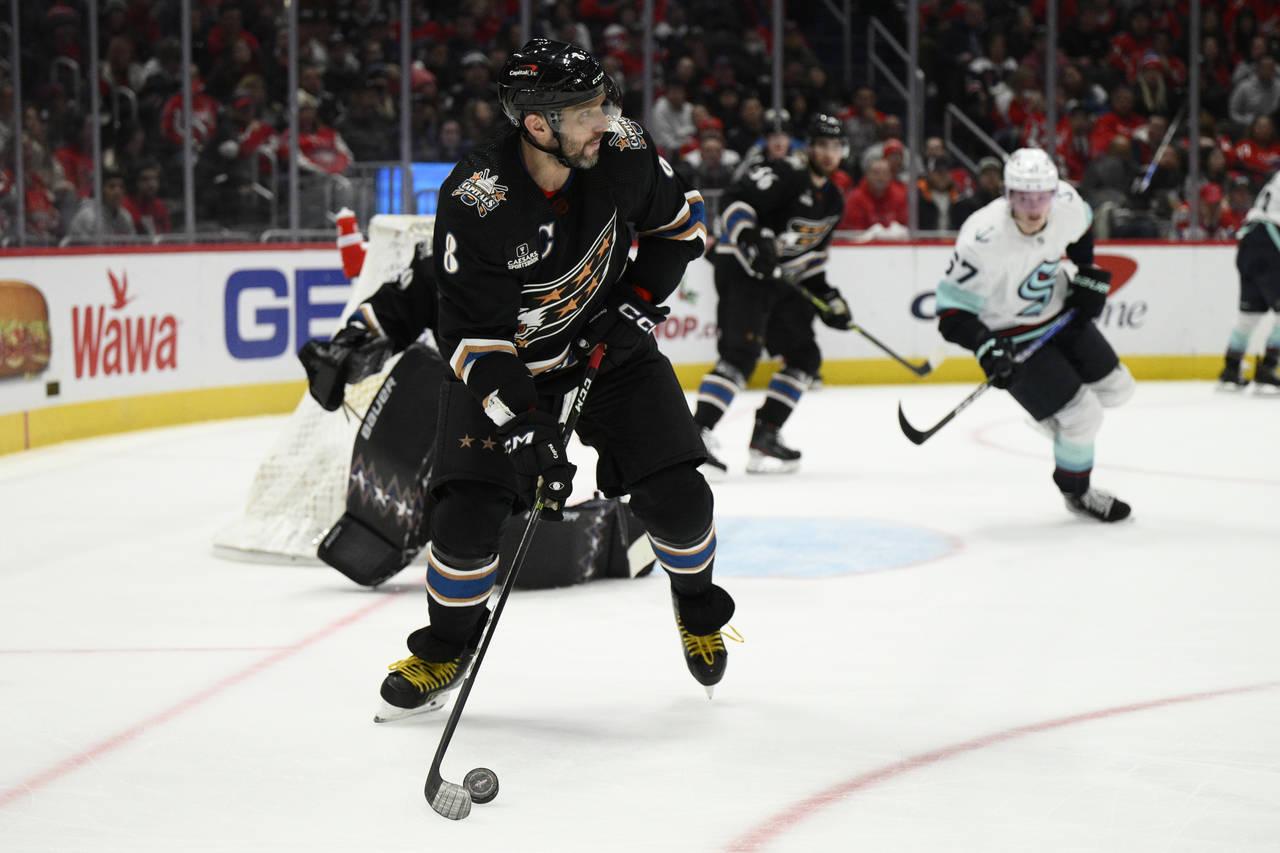 Washington Capitals left wing Alex Ovechkin (8) skates with the puck during the second period of th...