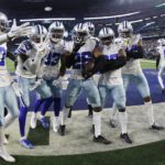 Prescott, Cowboys win 40-34, make Eagles wait on top seed