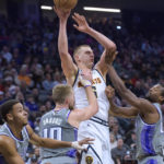 Monk scores 33, hits winning free throw as Kings top Nuggets