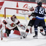 Connor's 3-point game leads Jets past Senators 5-1