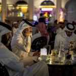 AP PHOTOS: Qatar bustles with life as World Cup nears end