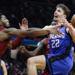 Mitchell scores 34, Cavaliers top Magic 107-96