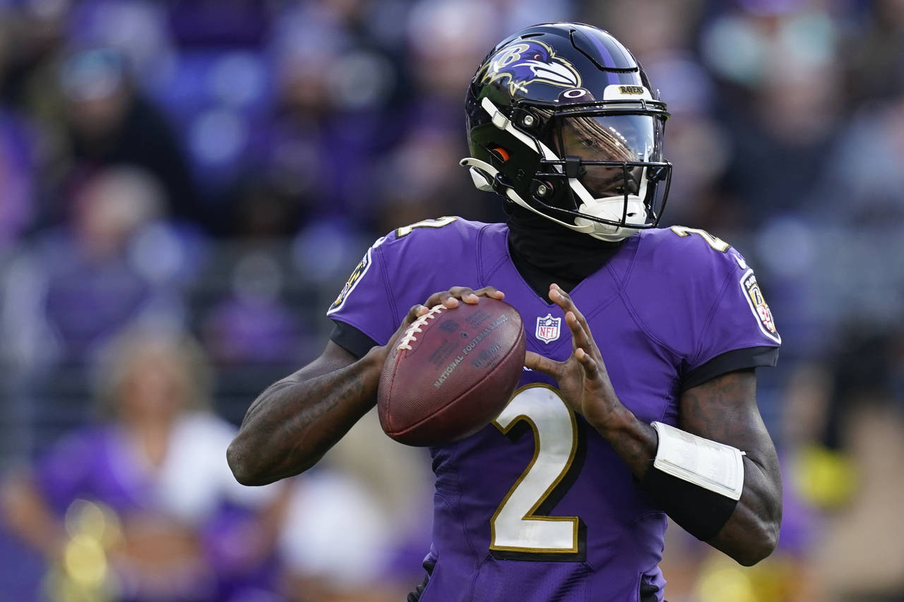 Baltimore Ravens quarterback Tyler Huntley (2) looks to pass in the second half of an NFL football ...