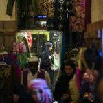AP PHOTOS: Qatar bustles with life as World Cup nears end