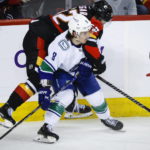 Kuzmenko scores in SO to give Canucks 4-3 win over Flames