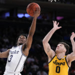 Roach leads No. 15 Duke past Iowa 74-62 in Jimmy V Classic