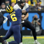 No. 2 Michigan beats Purdue 43-22 for Big Ten crown