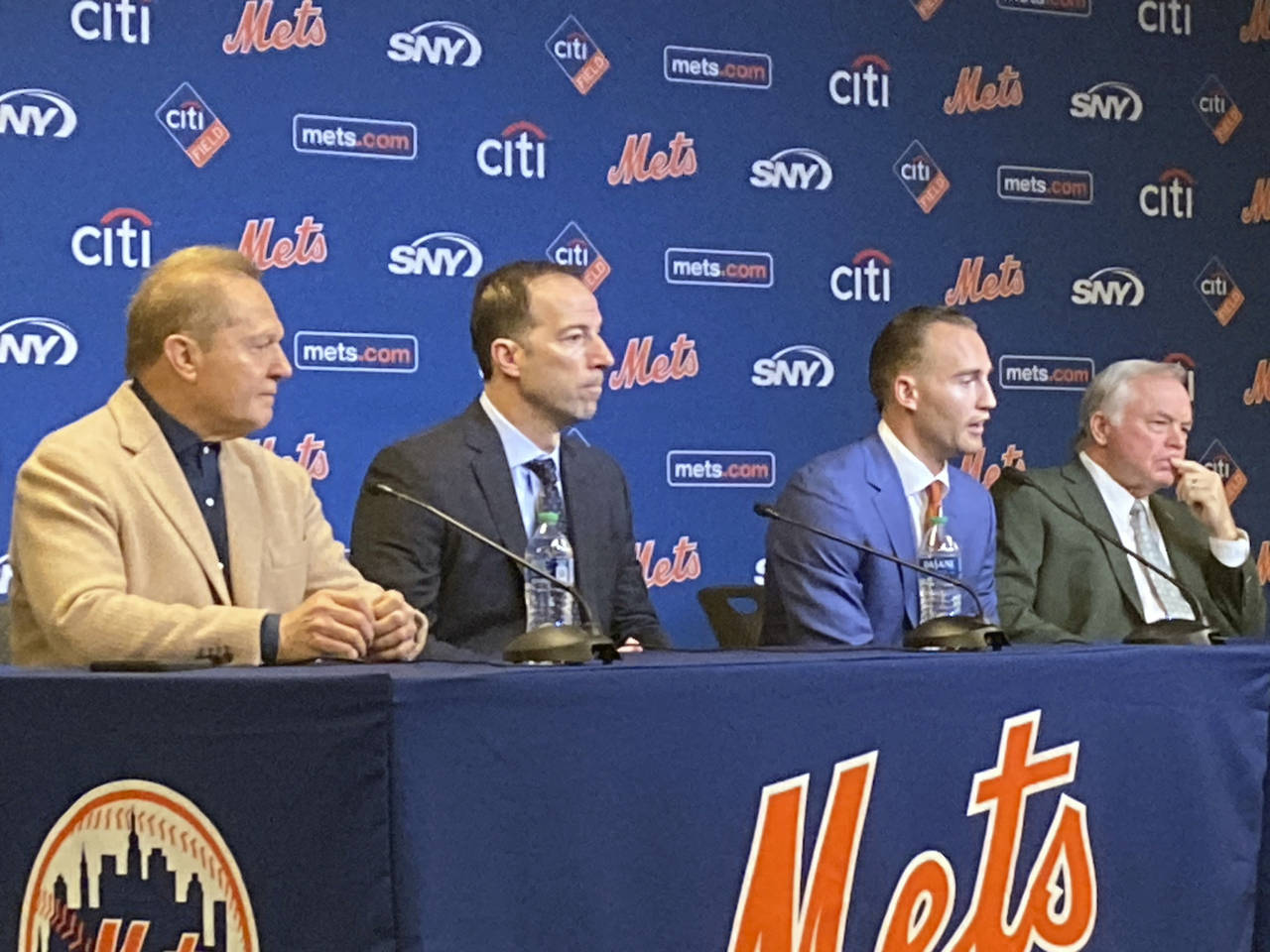 Agent Scott Boras, from left, New York Mets general manager Billy Eppler, Mets center fielder Brand...