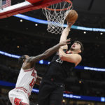Porter's 36 points lead Rockets past Bulls 133-118