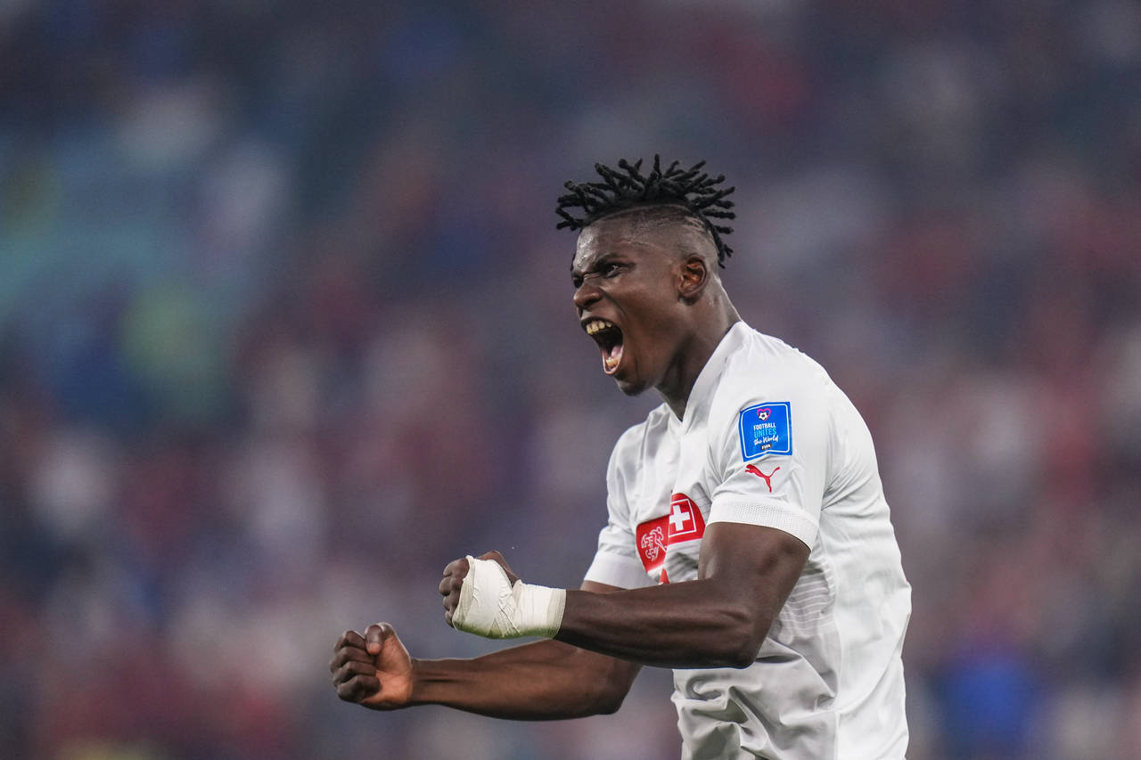 Switzerland's Breel Embolo celebrates after his teammate Switzerland's Remo Freuler scored his side...