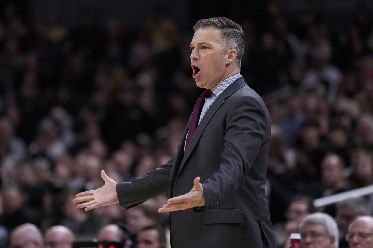 Davidson head coach Matt McKillop questions a call as his team played against Purdue in the second ...