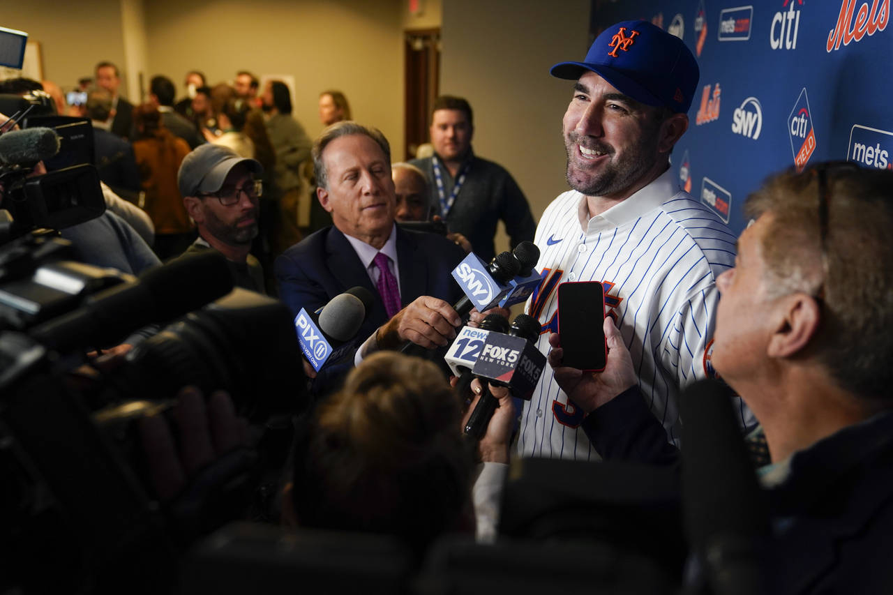 New York Mets baseball pitcher Justin Verlander talks with reporters at a news conference at Citi F...