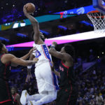 Harris, Embiid carry 76ers past Raptors 104-101 in overtime