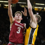 Wahl sparks Wisconsin to 78-75 victory over Iowa in overtime