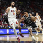 On Popovich's coaching anniversary, Spurs top Heat 115-111