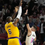 Heat get past Lakers 112-98, climb over .500 at 18-17
