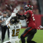 Brady's throws for 2 late TDs, Buccaneers beat Saints 17-16