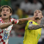 AP PHOTOS: World Cup highlights from Day 18