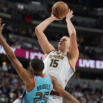 Jokic, Nuggets outlast Suns 128-125 in OT; Booker sidelined