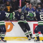 Horvat has 2 goals and 2 assists, Canucks beat Sharks 6-2