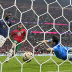 AP PHOTOS: World Cup highlights from Day 21