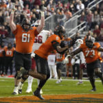 Wisconsin beats Oklahoma State 24-17 in Guaranteed Rate Bowl