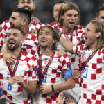 AP PHOTOS: World Cup highlights from Day 23